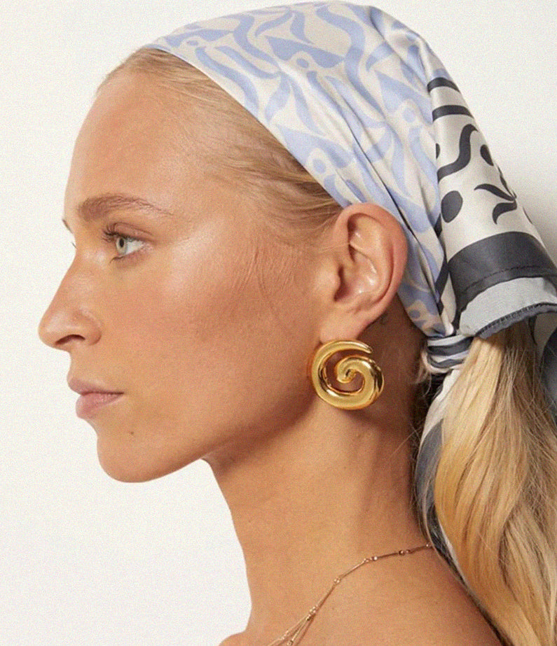 swirl gold earrings by briwok