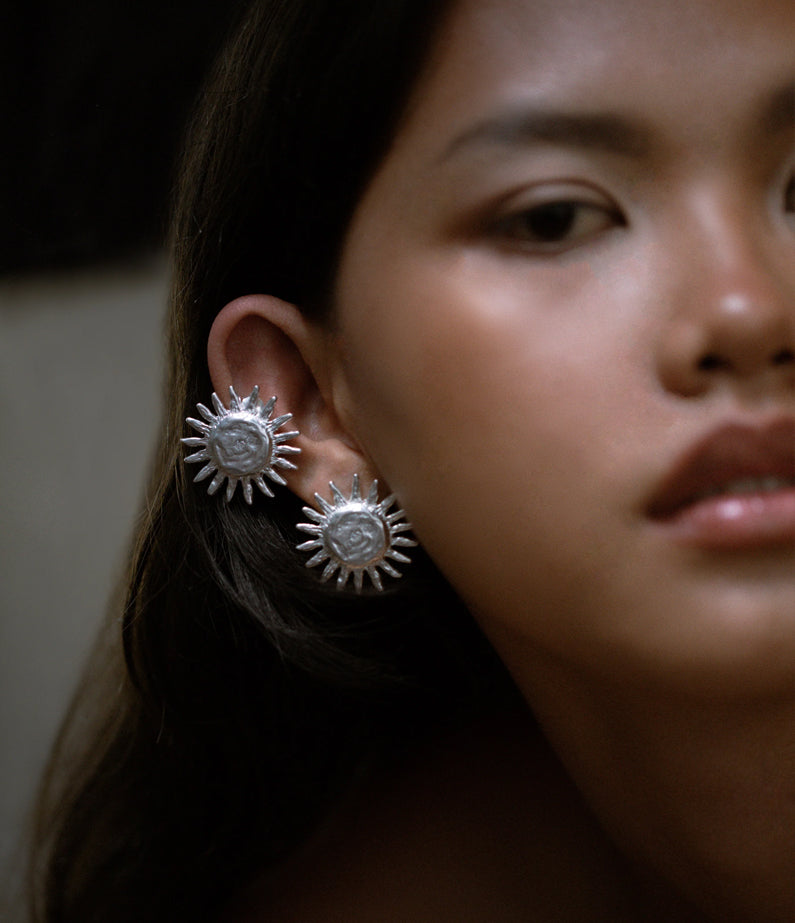 sun earrings silver by mais x frida
