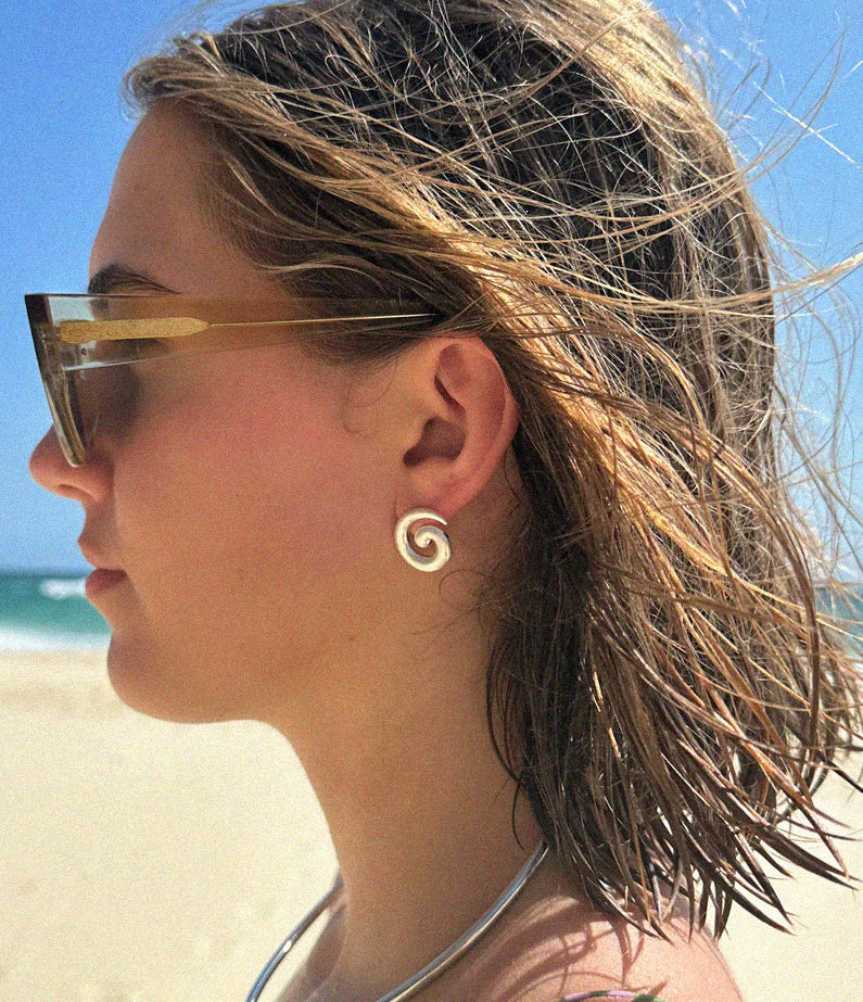 mini swirl silver earrings by briwok