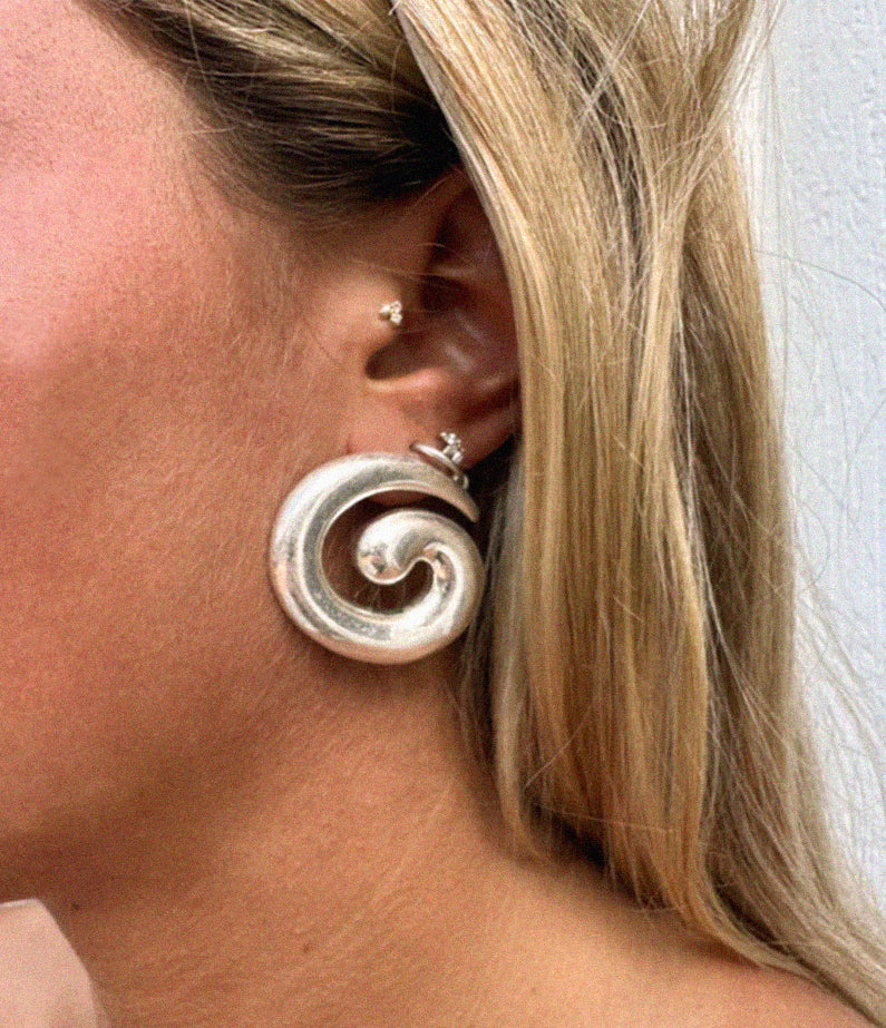 swirl silver earrings by briwok