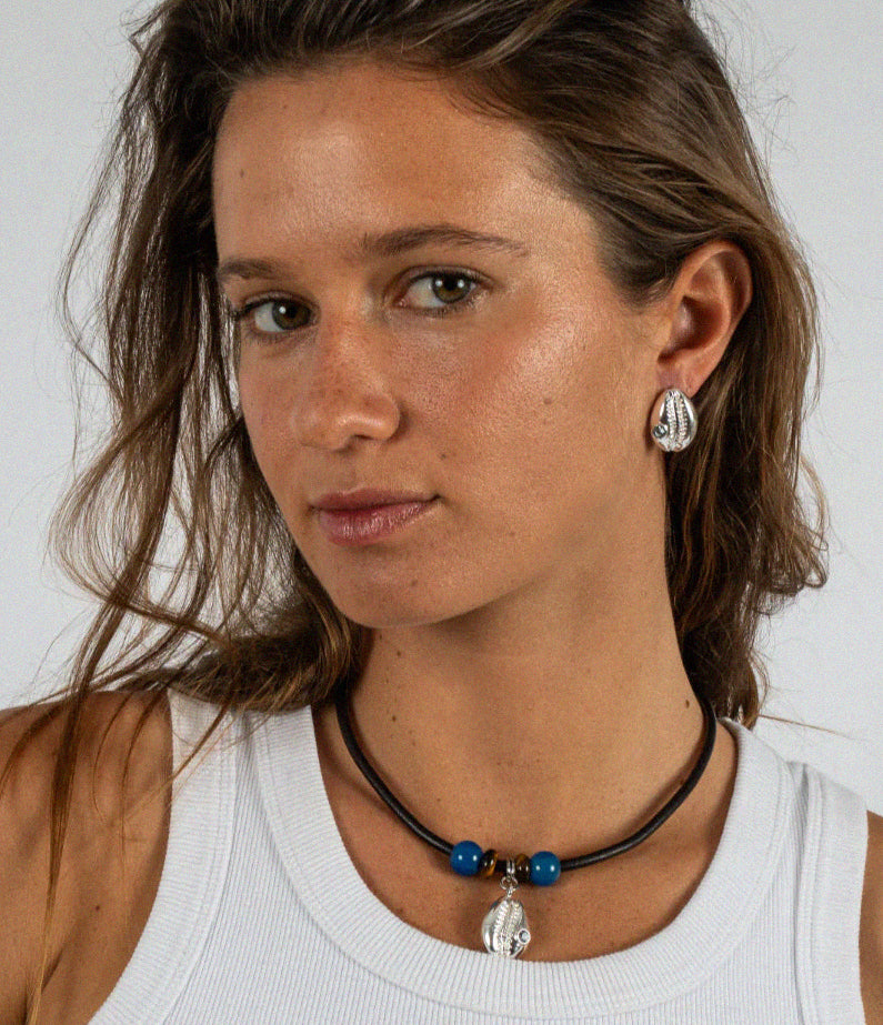 Cowrie silver earrings by briwok